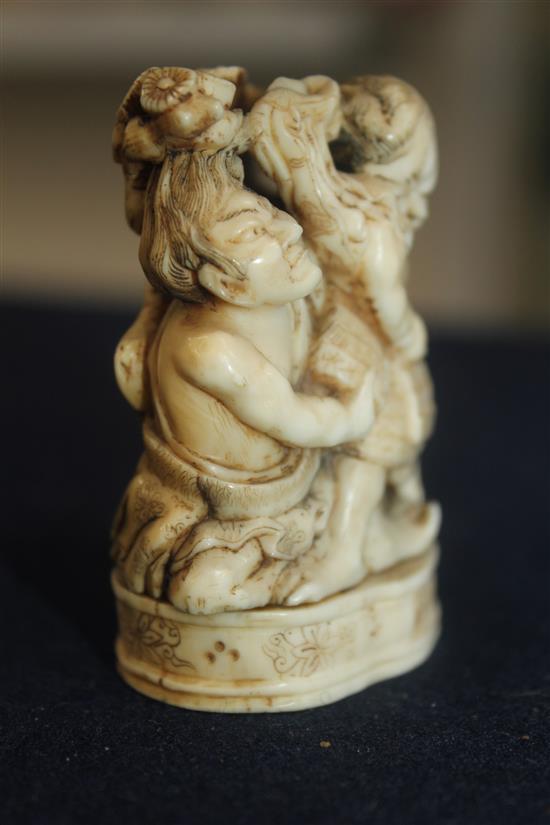 A Japanese walrus ivory okimono, Meiji period, 6.3cm